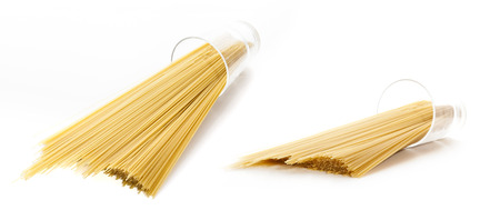 Uncooked pasta spaghetti on white backgroundの写真素材