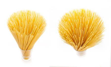 Uncooked pasta spaghetti on white backgroundの写真素材