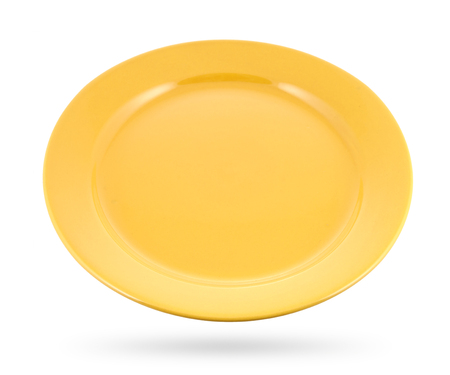 yellow empty plate on white with clipping pathの写真素材