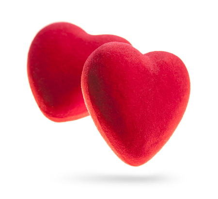 Two velvet hearts isolated on a white background. Concept for Valentine's Dayの写真素材