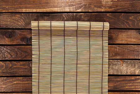 bamboo napkin on wooden table. top viewの写真素材