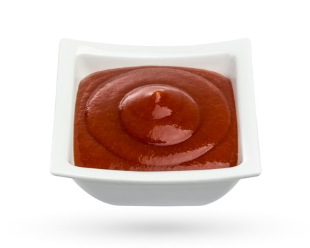 Bowl of ketchup or tomato sauce isolated on white background. With clipping path.の写真素材