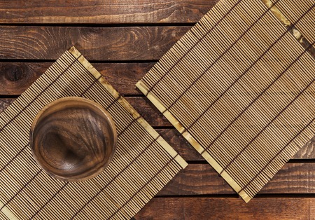 bamboo napkin on wooden table. top viewの写真素材