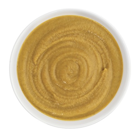 Bowl of mustard on white background. With clipping path.の写真素材