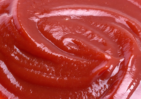 Ketchup or tomato sauce texture and backgroundの写真素材