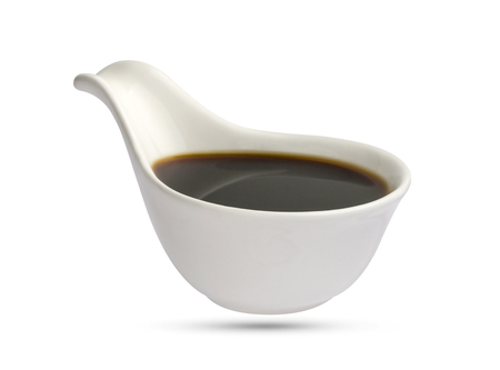 Dish with soy sauce isolated on white background.の写真素材