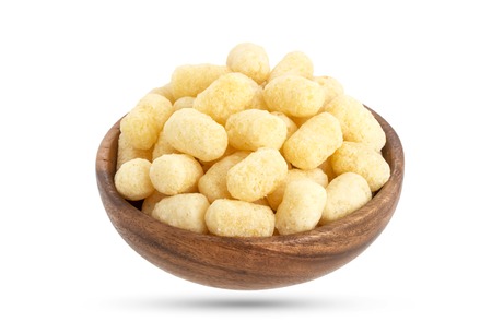 Sweet crunchy corn sticks or snacks backgroundの写真素材
