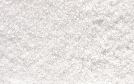 Granulated white sugar texture or background, top viewの写真素材