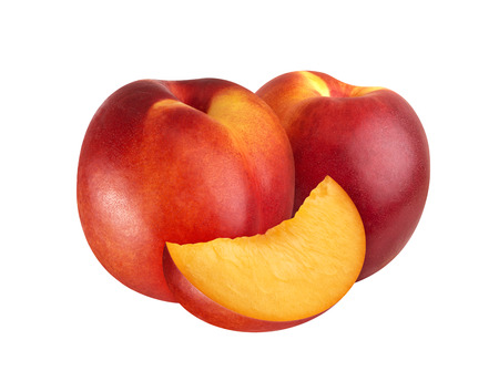 Ripe juicy nectarines isolated on white backgroundの写真素材