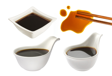 Bowl with soy sauce isolated on white backgroundの写真素材