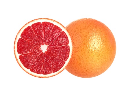 Pink grapefruit and slices isolated on white.の写真素材