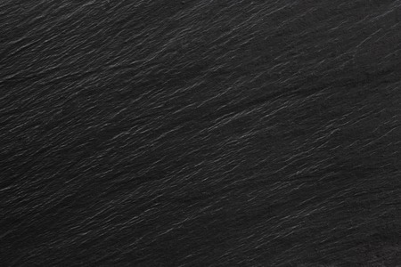 Dark black stone texture background for designの写真素材
