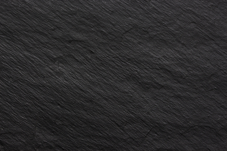 Dark black stone texture background for designの写真素材