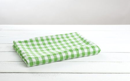 White wooden table with tablecloth, background for the product montageの写真素材