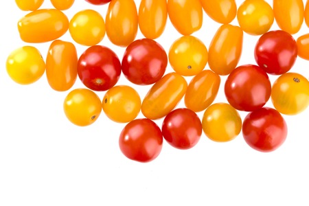 Group of very fresh cherry tomatoes isolated on a white backgroundの写真素材