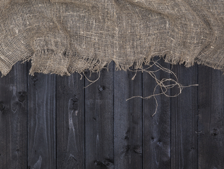Burlap hessian or sacking on wooden backgroundの写真素材