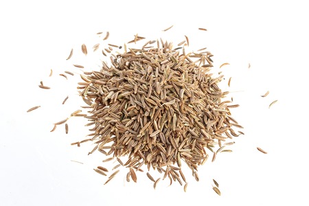 Cumin seeds or caraway isolated on white background, top viewの写真素材