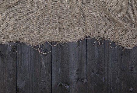 Burlap hessian or sacking on wooden backgroundの写真素材