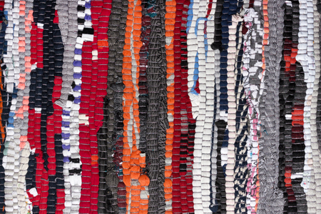 Colorful woven handmade fabric texture motley rug or carpetの写真素材