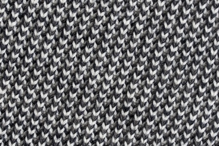 Black and white knitted wool background or textureの写真素材