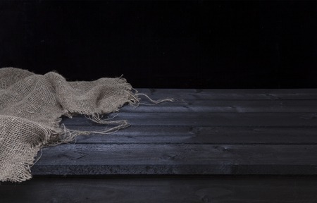 Dark wooden board table for product display montage, black wooden perspective interiorの写真素材