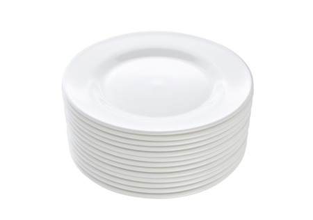 Stack of plates isolated on white table backgroundの写真素材