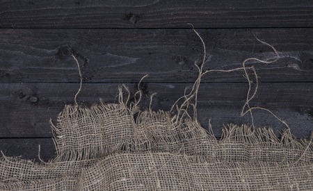 Burlap hessian or sacking on wooden backgroundの写真素材