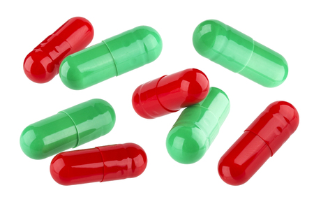 Medical pill capsules isolated on white backgroundの写真素材