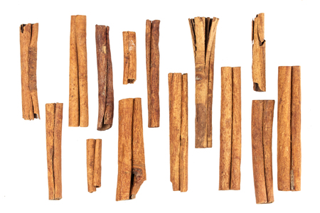 Cinnamon sticks isolated on white background with clipping pathの写真素材