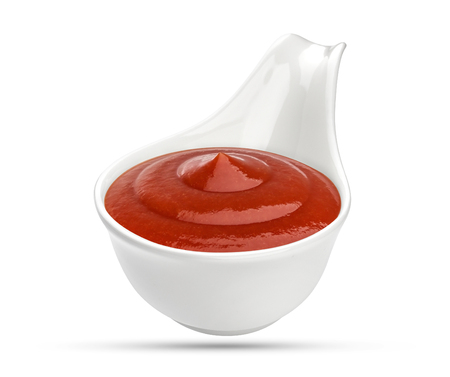 Ketchup in bowl isolated on white background. Portion of red tomato sauce. With clipping path.の写真素材