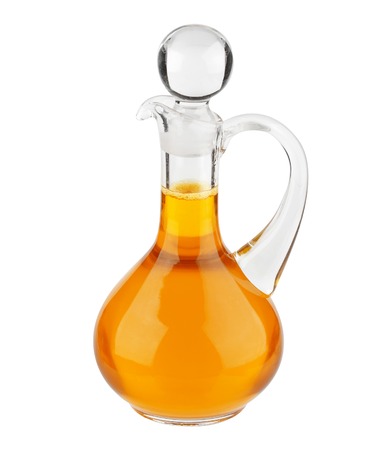 Vegetable oil glass bottle isolated on white backgroundの写真素材