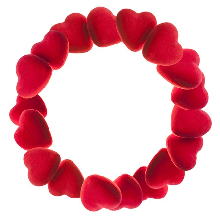 Round frame of red hearts isolated on whiteの写真素材