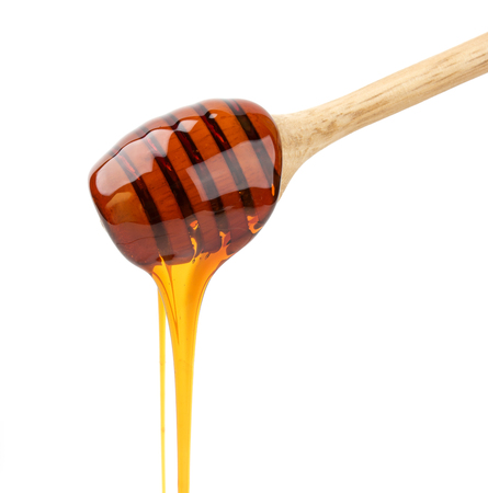 Honey stick isolated on white, with clipping pathの写真素材