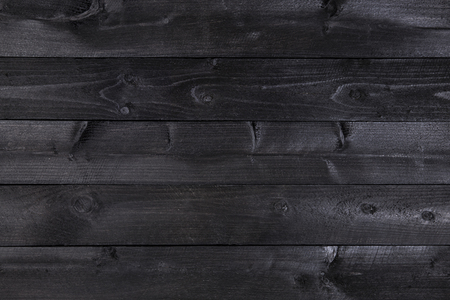 Black wooden backgroundの写真素材