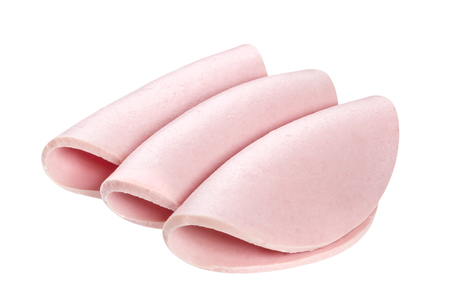 Boiled sausage slices on white backgroundの写真素材