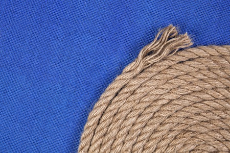 Ship rope on blue background, top view with copy spaceの写真素材