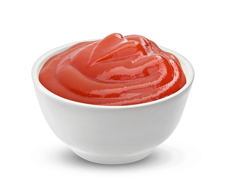 Ketchup in bowl isolated on white background. Portion of tomato sauce. With clipping path, one of the collection of various saucesの写真素材