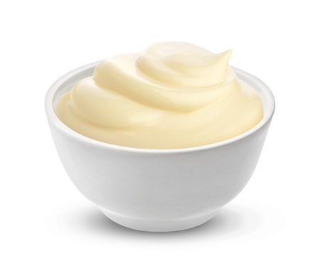 Mayonnaise sauce in bowl isolated on white background with clipping path. One of the collection of various saucesの写真素材