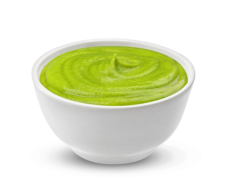 Bowl with wasabi sauce isolated on white background, one of the collection of various saucesの写真素材