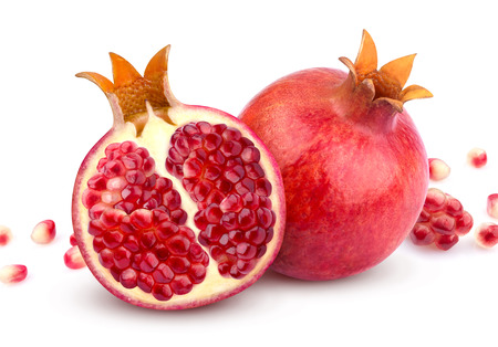 Pomegranate isolated. Whole pomegranate and its half isolated on white backgroundの写真素材
