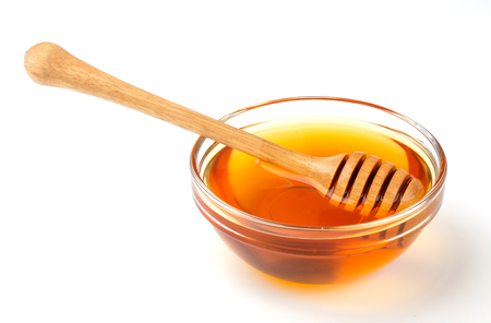 Honey isolated on whiteの写真素材