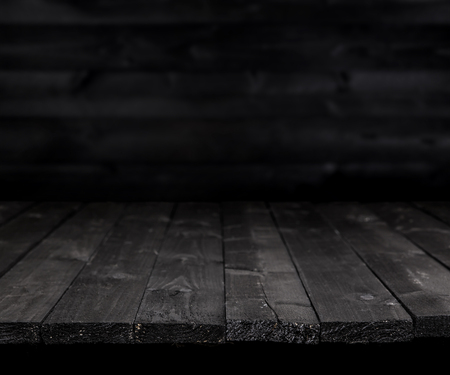 Dark wooden table for product, old black wooden perspective interiorの写真素材