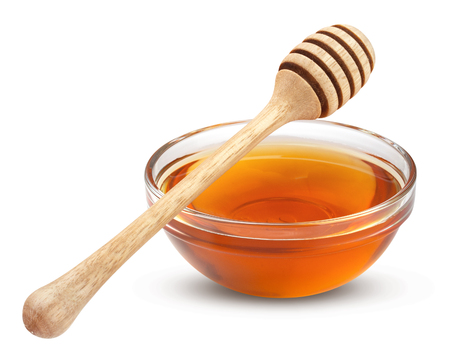 Honey isolated on whiteの写真素材