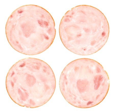 Ham slice isolated. Boiled and smoked ham or sausage isolated on white background, top viewの写真素材