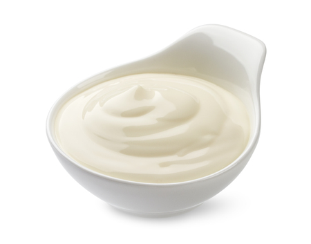 Sour cream in bowl isolated on white backgroundの写真素材