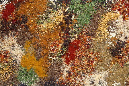Different herbs and spices texture, colorful food backgroundの写真素材