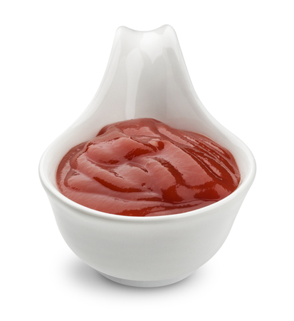 Bowl of ketchup isolated on white background, tomato sauceの写真素材