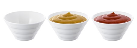 Ketchup and mustard isolated on white backgroundの写真素材