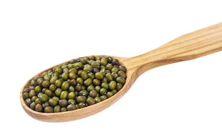 Green mung in wooden spoon isolated on white background. One of the collectionの写真素材