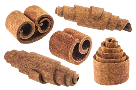 Cinnamon sticks isolated on white background closeupの写真素材